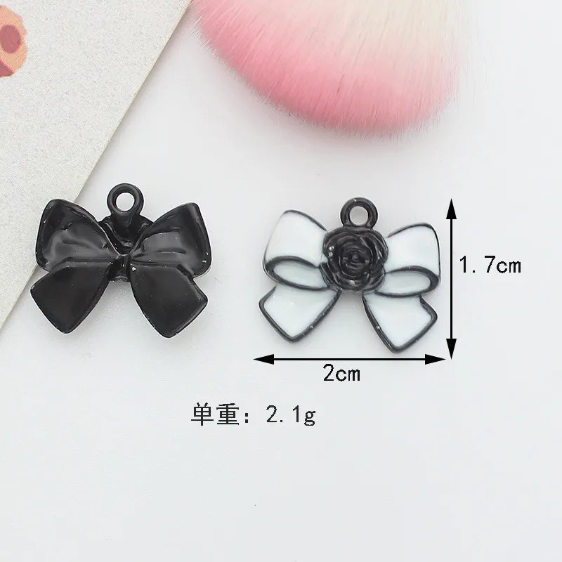 10 PCS/Package 1.5 * 20mm 14 * 14mm 7 * 12mm Alloy Rhinestones Pearl Number Heart Shape Bow Knot Polished Pendant