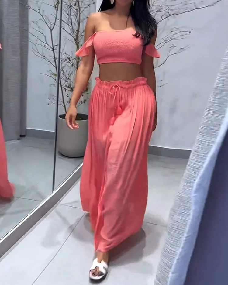 Sleeveless solid color two piece suit