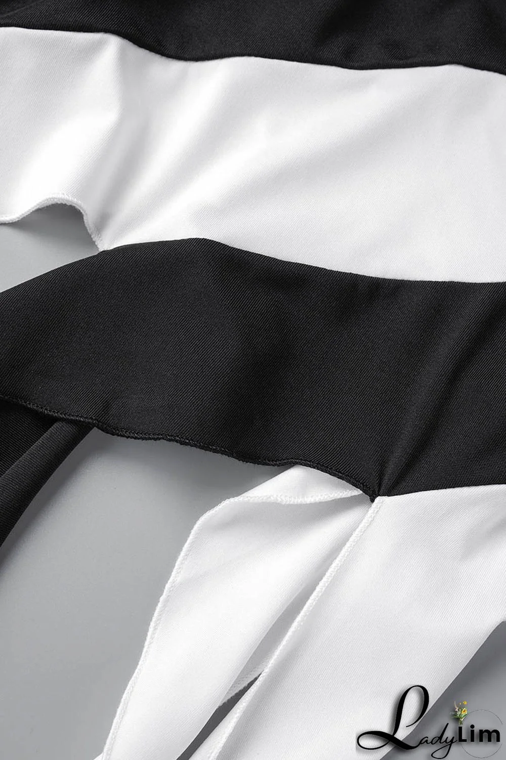 Orange Sexy Patchwork Tassel Contrast Oblique Collar Sleeveless Two Pieces