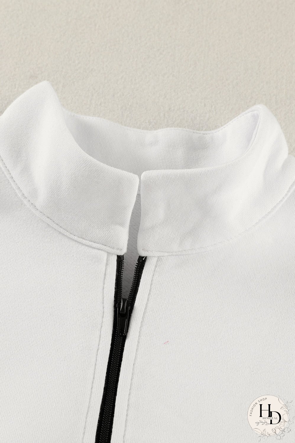 Cozy White Ribbed Pullover with Quarter-Zip Detail