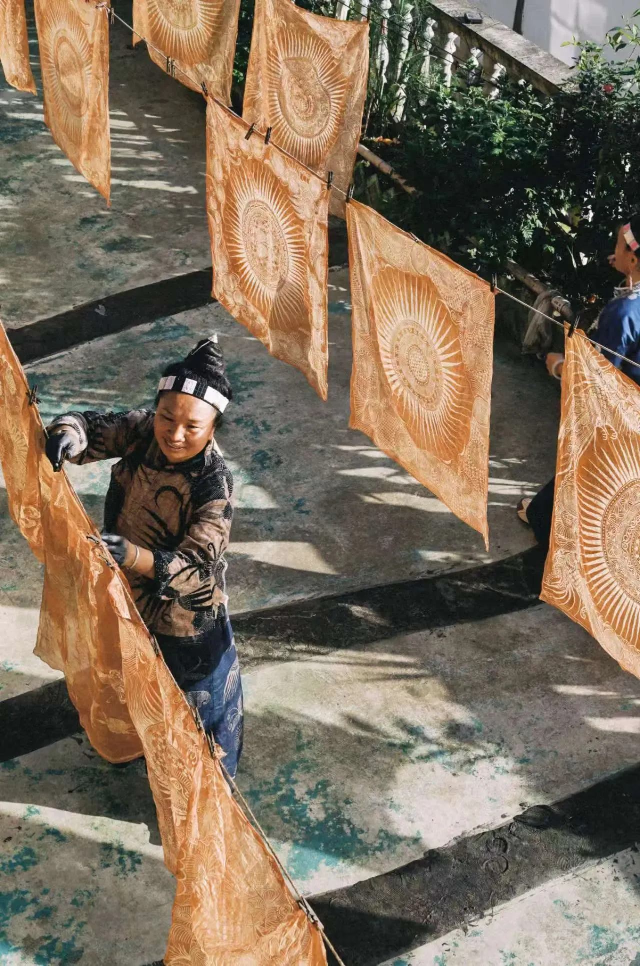 Hidden Indigo handmade batik and Miao embroidery jewelry