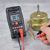 🔧⚡️ Multim&egrave;tre intelligent anti-br&ucirc;lure ! Outil de mesure sans faille de la taille d'une paume de main, avec une gamme automatique de 4000 points ✨