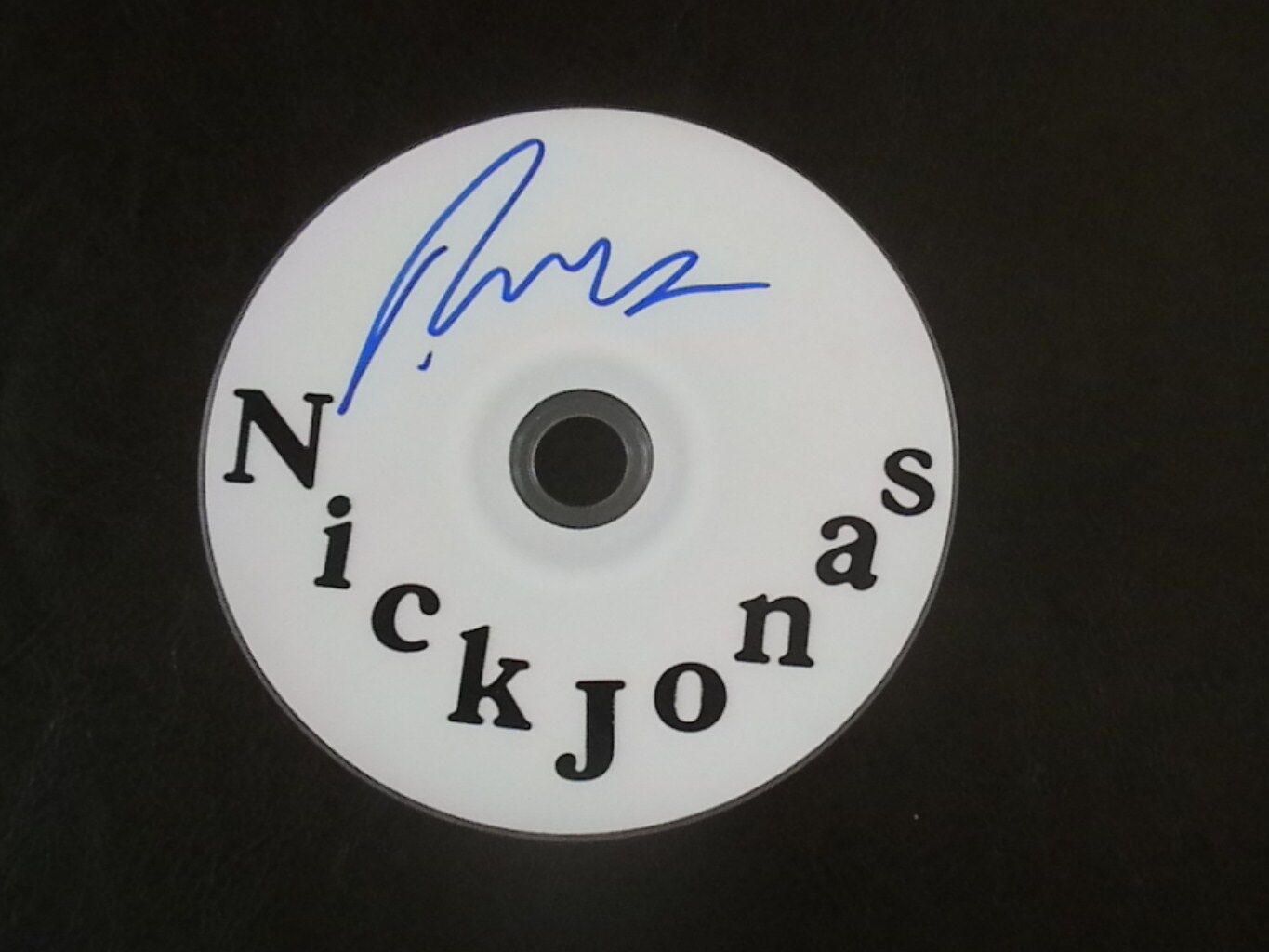 NICK JONAS 'THE JONAS BROTHERS' SIGNED BLANK CD 2