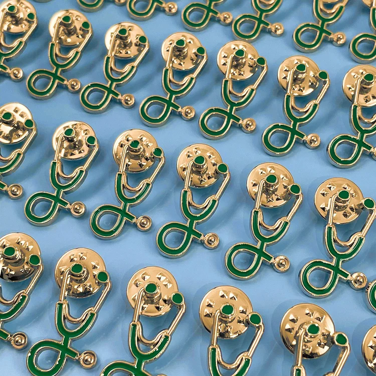 25pc Green/Gold Stethoscope Pin Pack