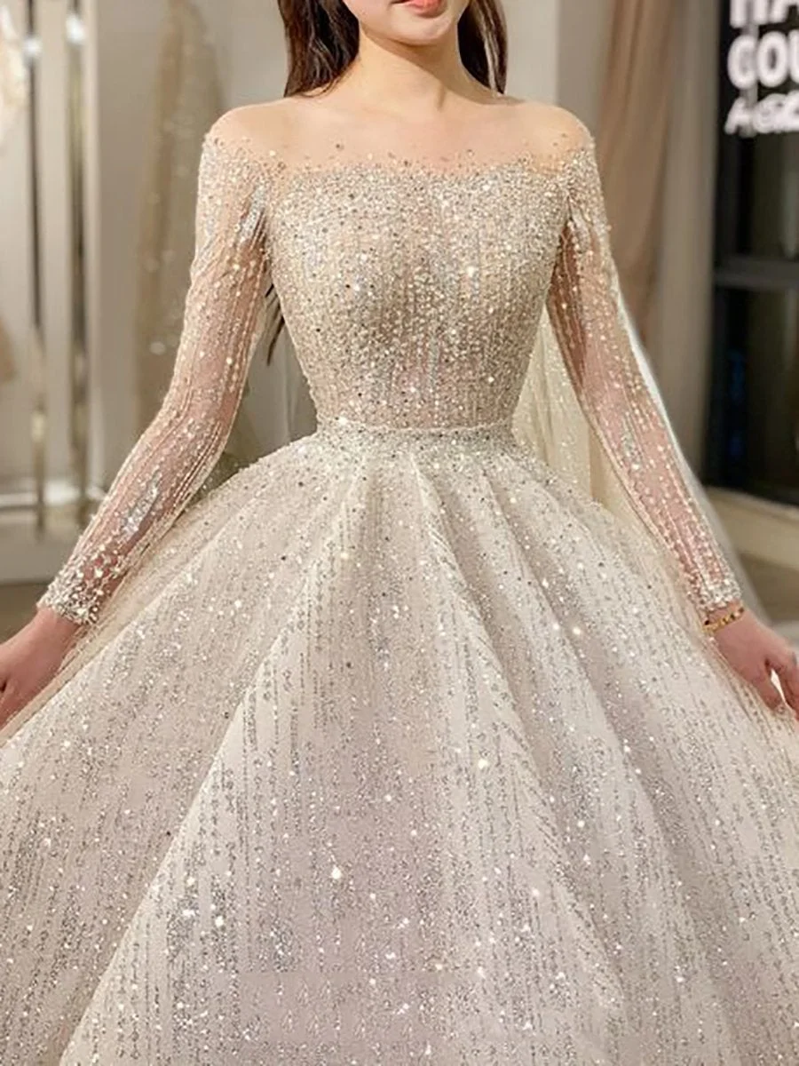 Midi sequined dress with round neck and long sleeves