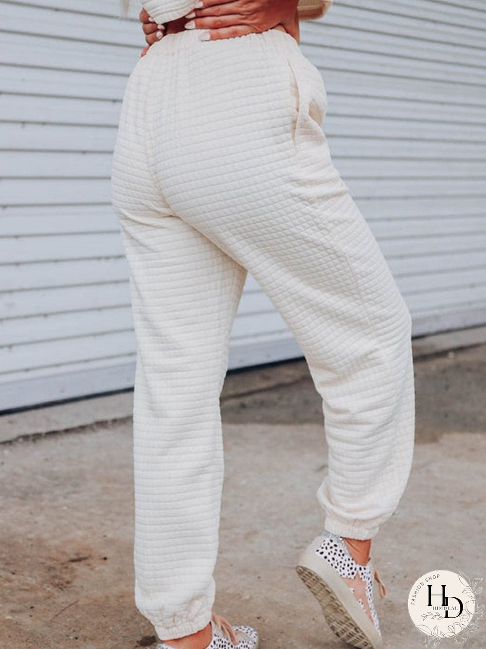 Chic White Textured Lattice Crop Top and Jogger Pants Ensemble
