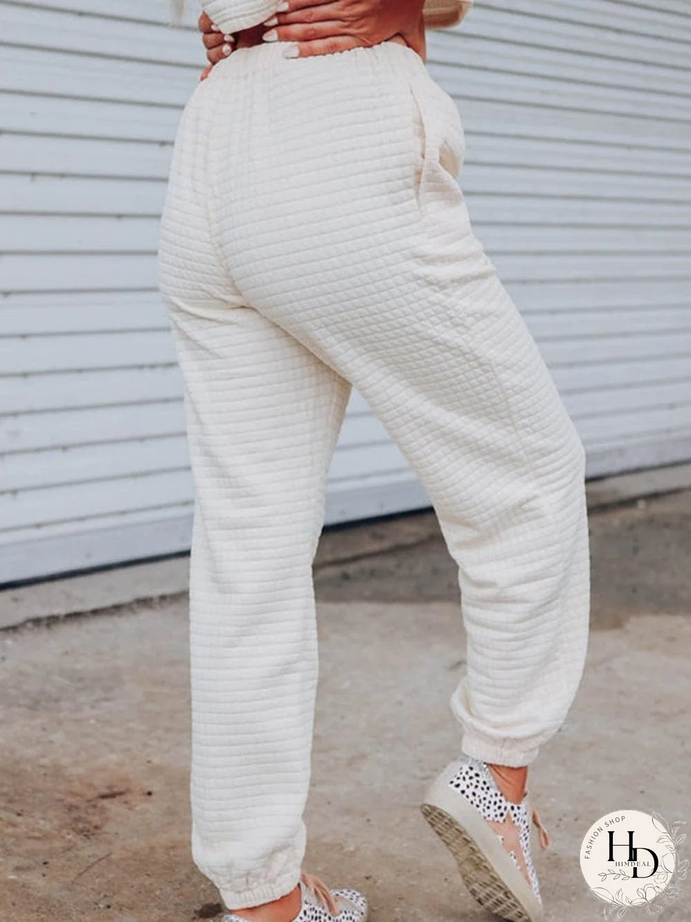 Chic White Textured Lattice Crop Top and Jogger Pants Ensemble