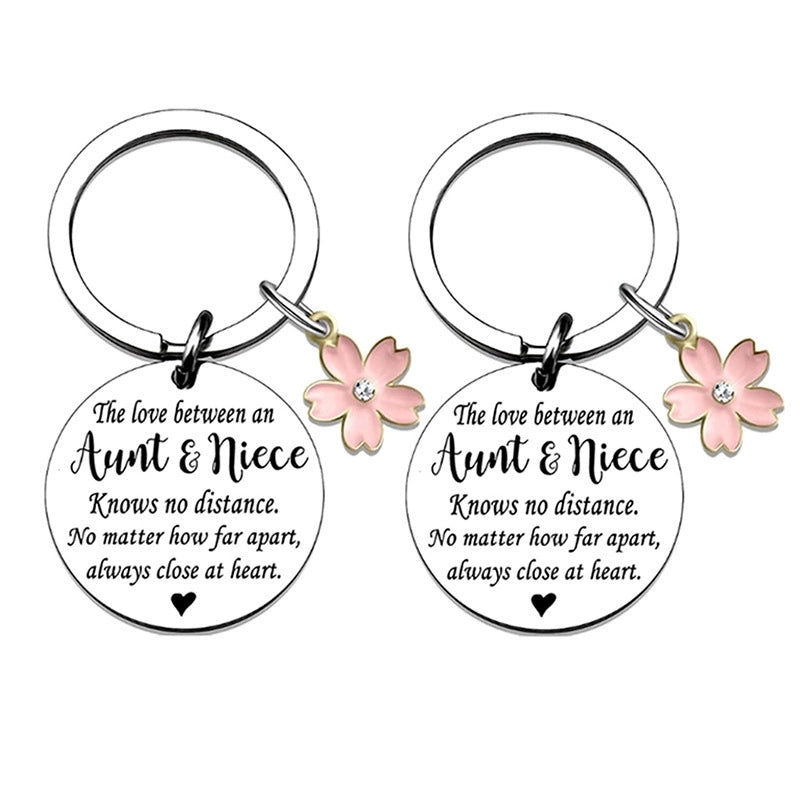 Casual Minimalist Letter Flower 304 Stainless Steel Iron Polishing Plating Laser White Gold Plated Bag Pendant Memorial Keychains