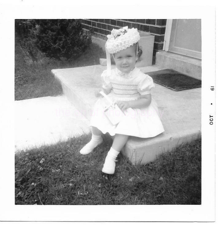 A LITTLE GIRL WEARING A WHITE DRESS 60's Found Photo Poster painting bw Original Snapshot 012 15