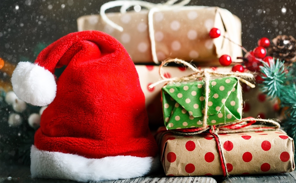 Santa hat and christmas gifts
