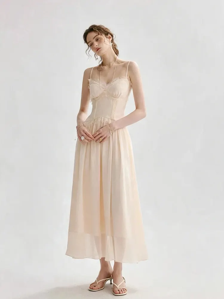 Light peach-colored spaghetti strap lace-trimmed long dress
