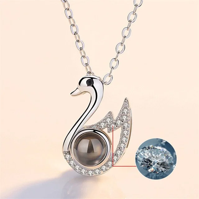 Buzzdaisy Swan Projection Pendant Necklace