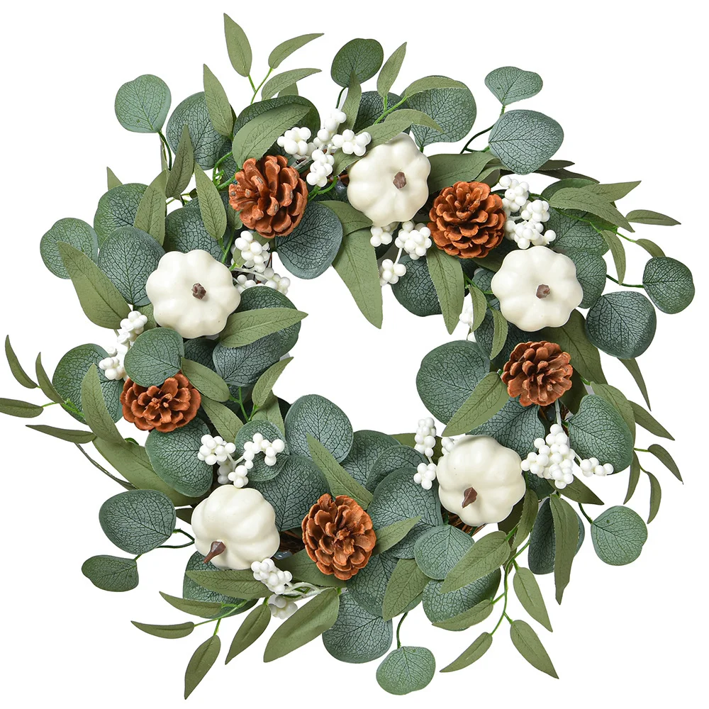 White pumpkin wreath decoration with eucalyptus leaves
