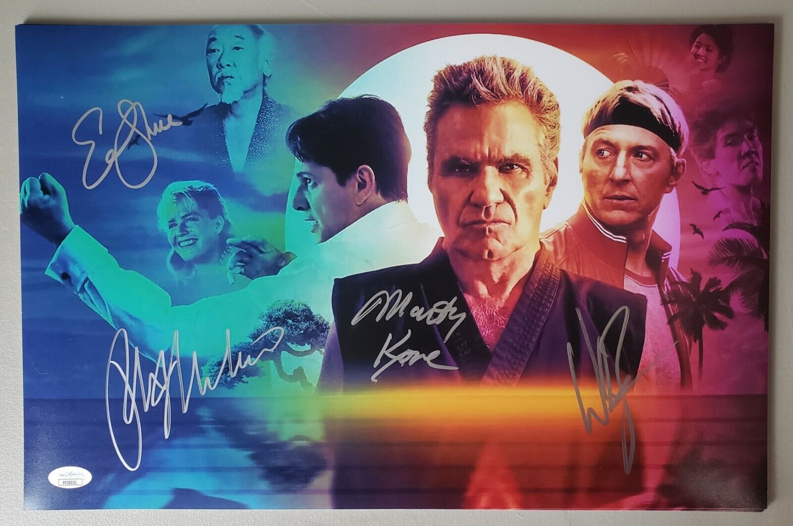 11x17 signed by William Zabka, Macchio, Shue and Martin Kove in Cobra Kai. JSA