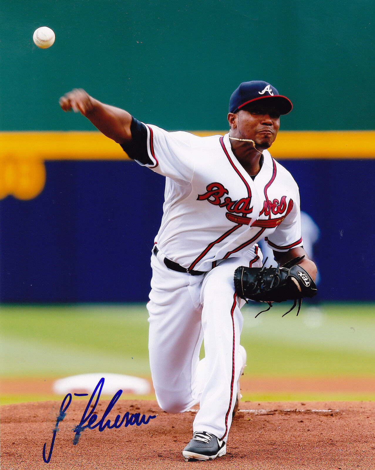 JULIO TEHERAN ATLANTA BRAVES (SLIGHT SMEAR) ACTION SIGNED 8x10