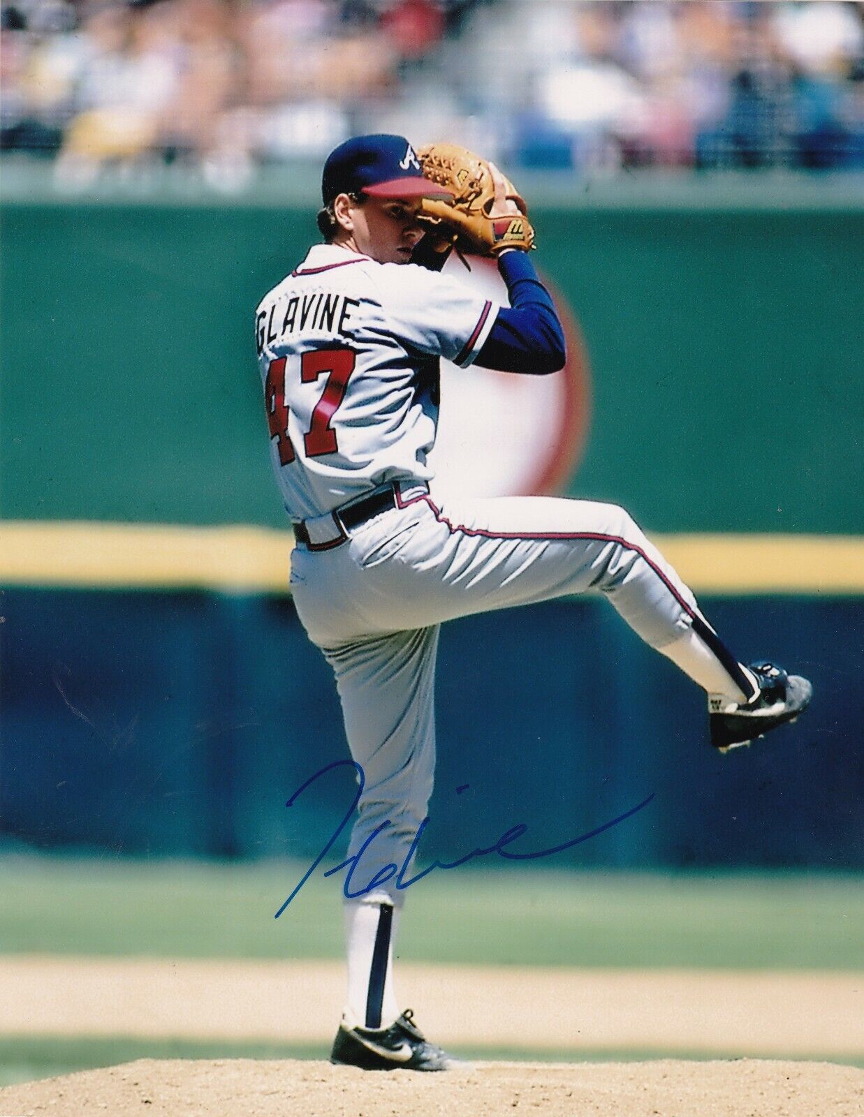 TOM GLAVINE ATLANTA BRAVES ACTION SIGNED 8x10