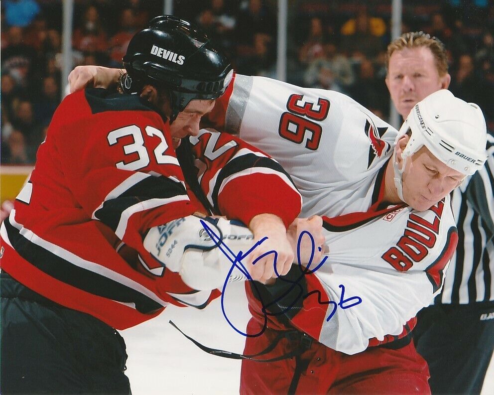 JESSE BOULERICE SIGNED CAROLINA HURRICANES HOCKEY FIGHT 8x10 Photo Poster painting #1 Autograph