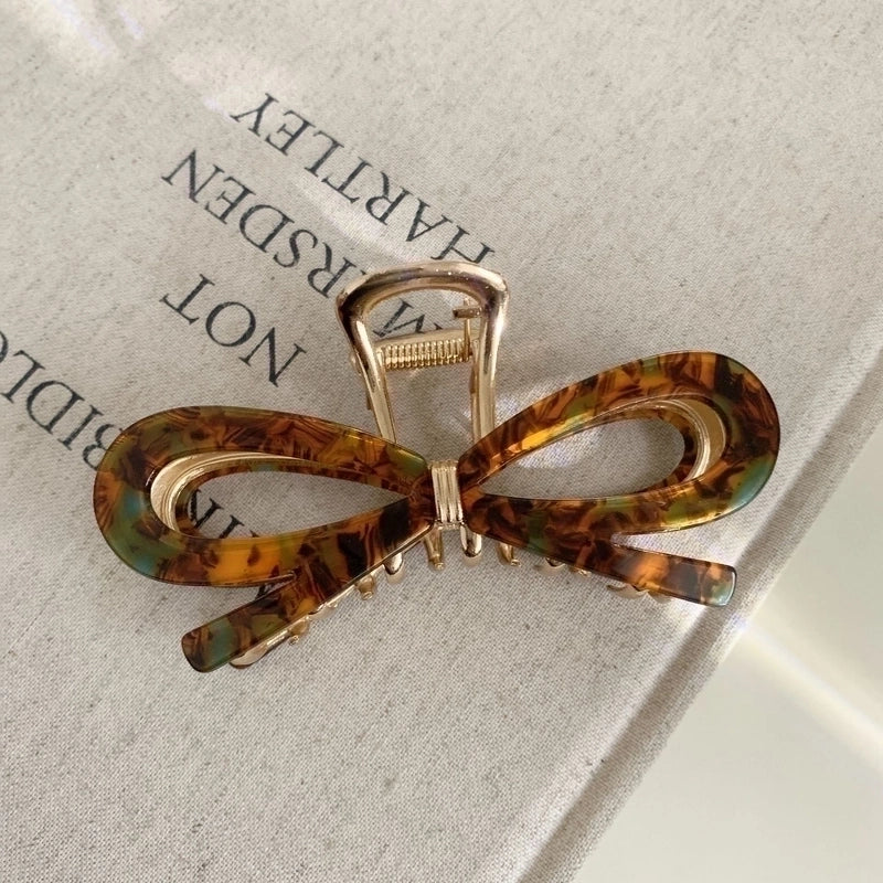 Women’s Classic Style Bow Knot Acetic Acid Sheets Metal Criss Cross Hair Claws