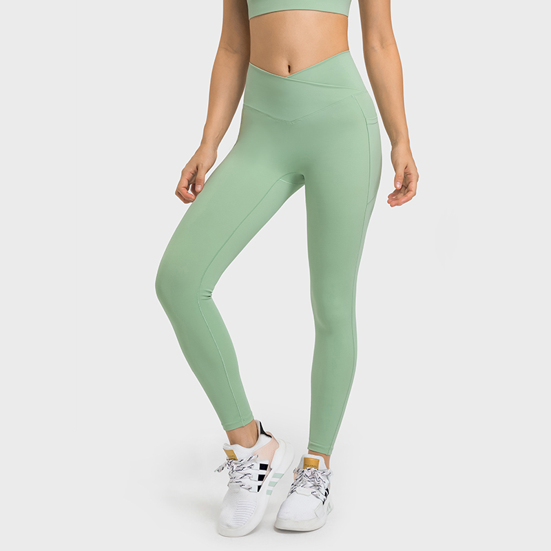 Hergymclothing Light Mint no camel toe quick dry bubble peach butt lifting naked feeling skin friendly cross waist yoga pants with phone pockets for sale