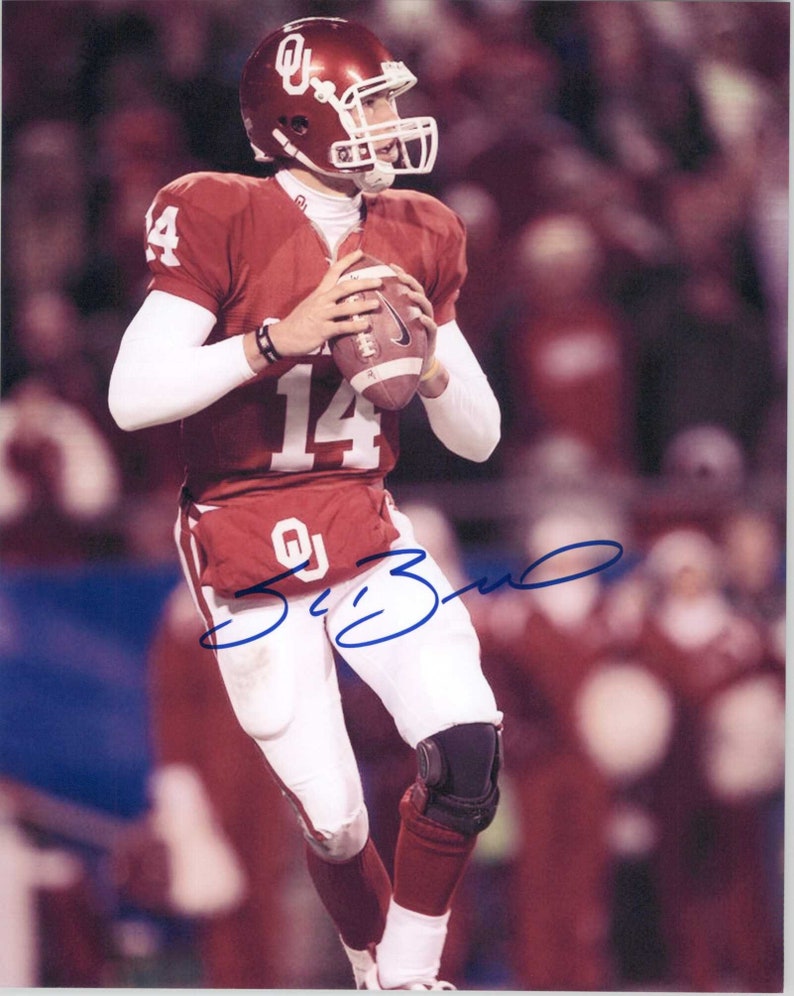 Sam Bradford Signed Autographed Glossy 8x10 Photo Poster painting Oklahoma Sooners - COA Matching Holograms