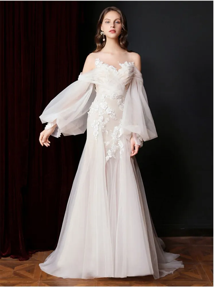 Romantic Off-Shoulder Lace Wedding Dress &ndash; Elegant Sheer Tulle Sleeve Bridal Gown with Floral Appliqu&eacute; & Flowing A-Line Skirt