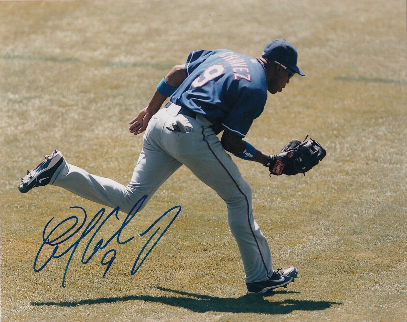 ENDY CHAVEZ TEXAS RANGERS ACTION SIGNED 8x10