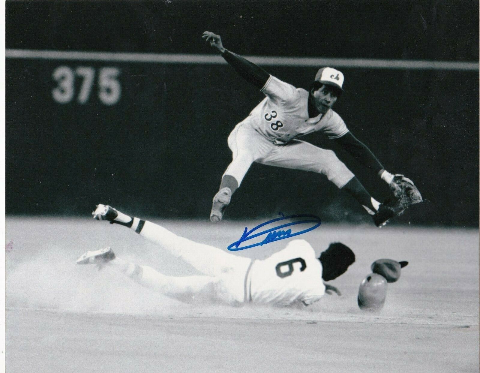 PEPE FRIAS MONTREAL EXPOS ACTION SIGNED 8x10