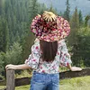 2 in 1 Bamboo Foldable Hand Fan Sun Hat Floral Printed Chinese Style Handheld Foldable Wide Brim Hat for Women Outdoor Beach Travel Accessory