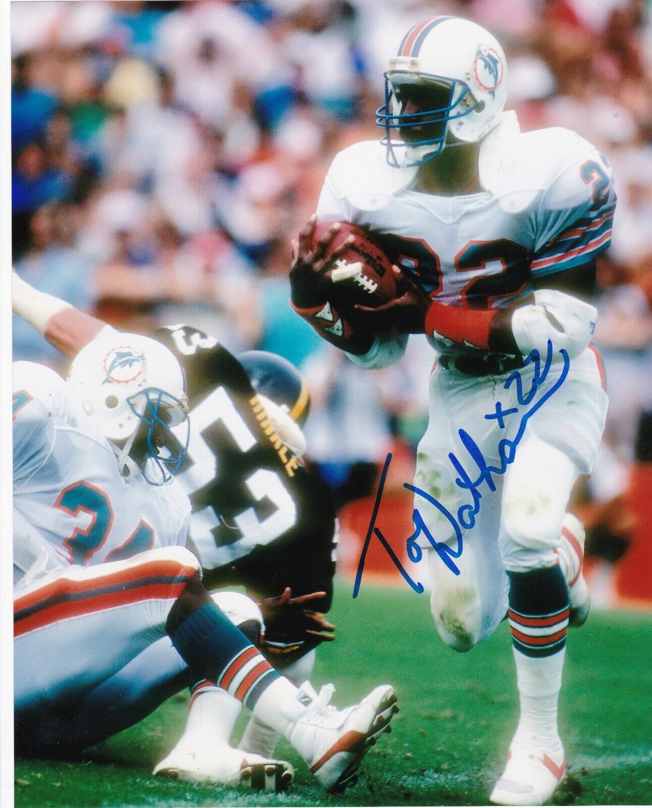 TONY NATHAN MIAMI DOLPHINS ACTION SIGNED 8x10