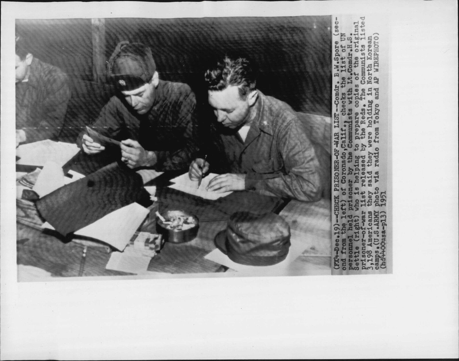 American Prisoner Lists Being Checked 1951 Korea War Press Photo Poster painting