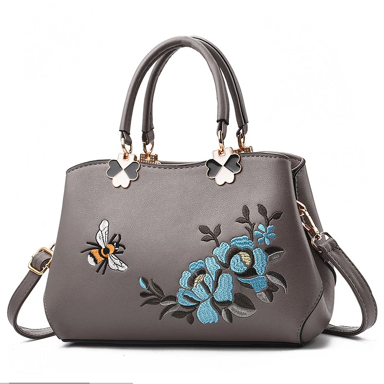 Simple handbag fashion embroidered soft leather middle-aged mother bag can be one shoulder
