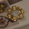 Medieval vintage Western palace three-dimensional inlaid copper gold-plated color-preserving quality Austrian crystal bracelet earrings