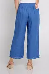 Back view of women's blue summer trousers showing elasticated waistband and relaxed fit