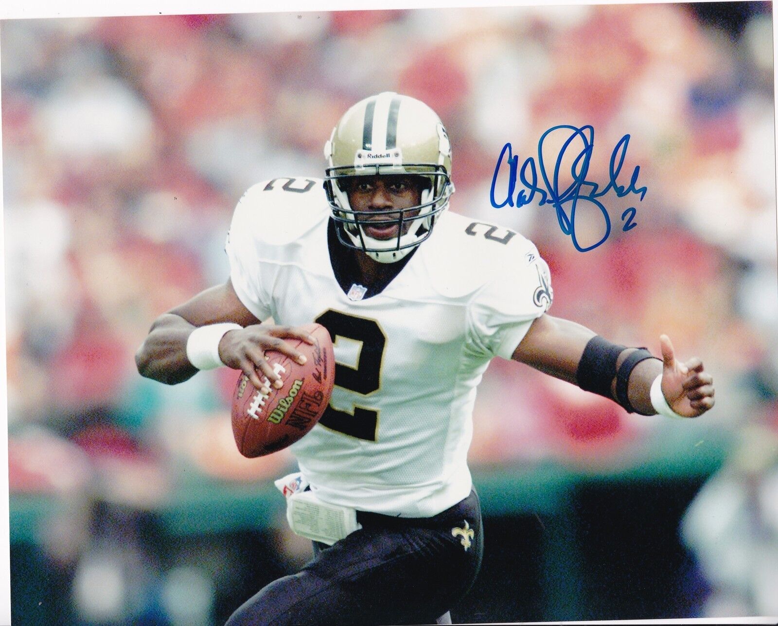 AARON BROOKS NEW ORLEANS SAINTS ACTION SIGNED 8x10