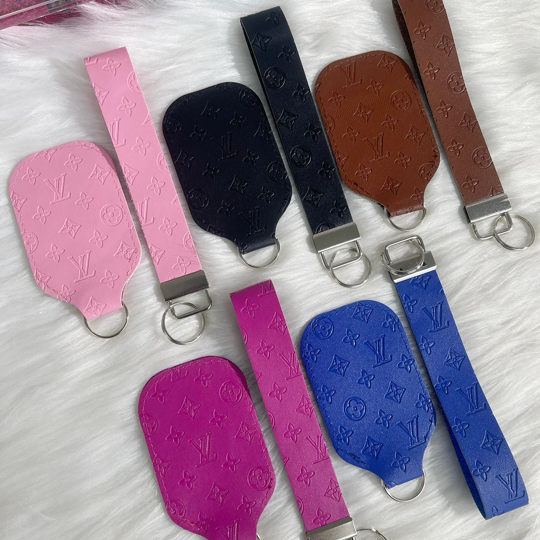 L0UIS V leather wristlet & lipstick bag (LIMITED)