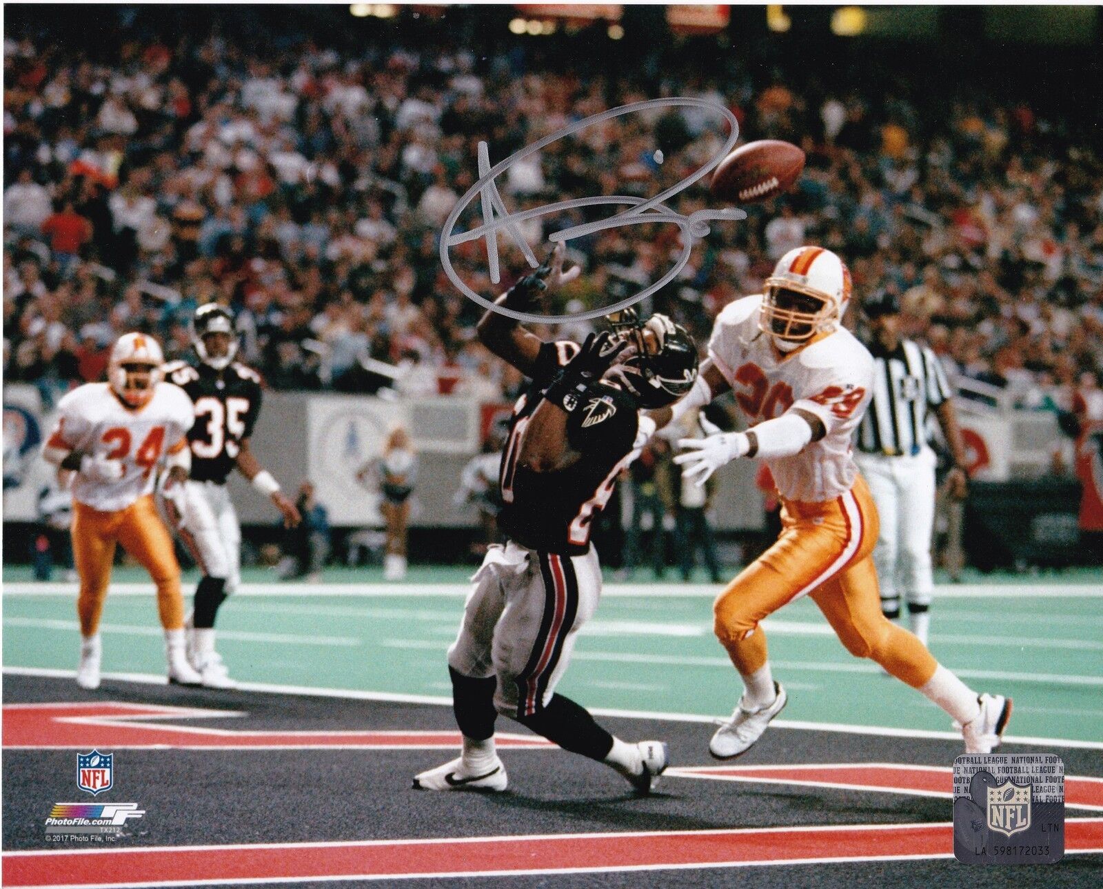 ANDRE RISON ATLANTA FALCONS ACTION SIGNED 8x10