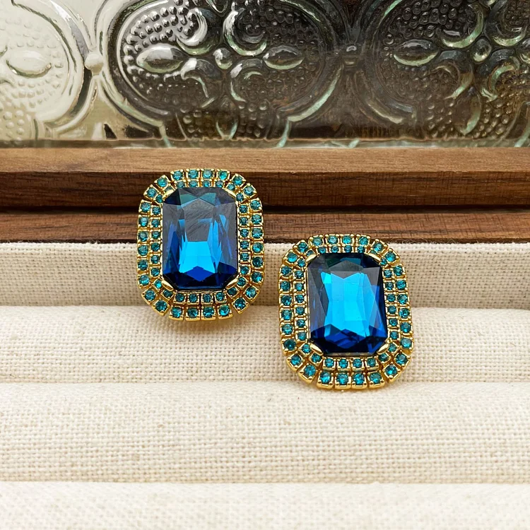 Geometrically inlaid sapphire medieval earrings