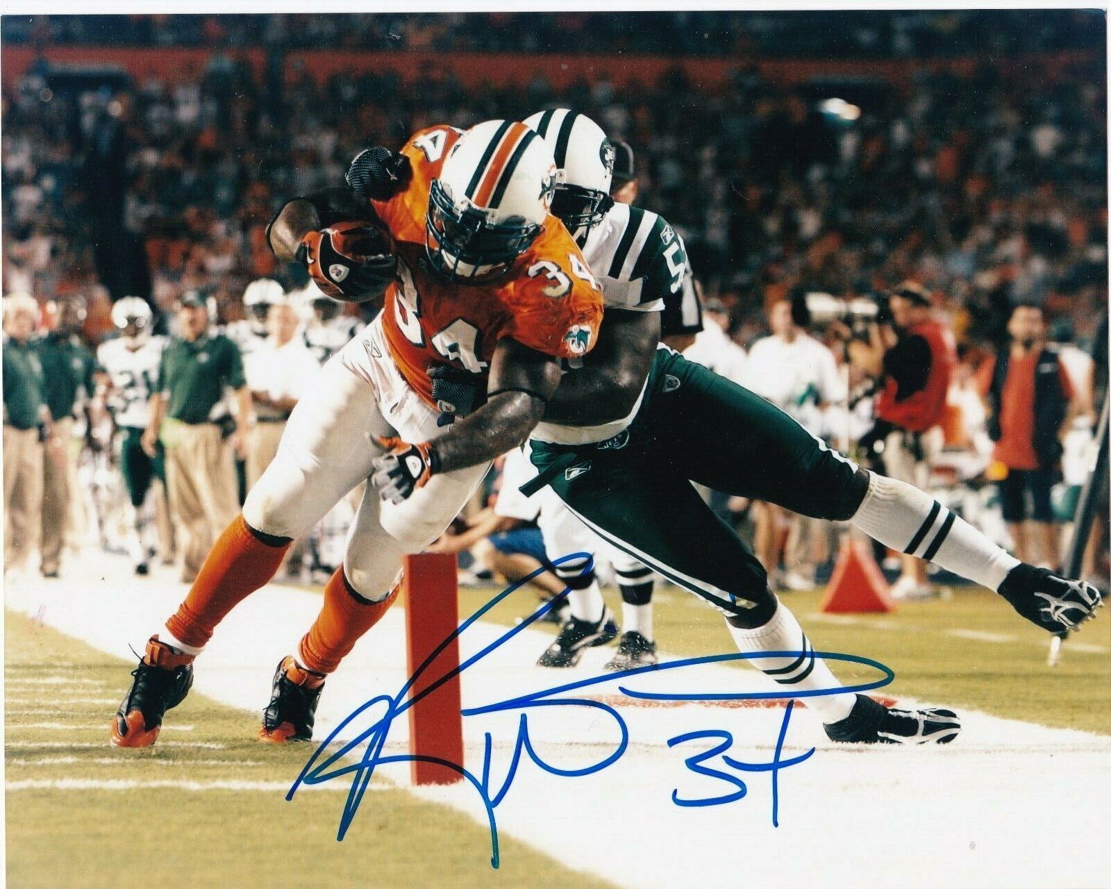 RICKY WILLIAMS MIAMI DOLPHINS ACTION SIGNED 8x10