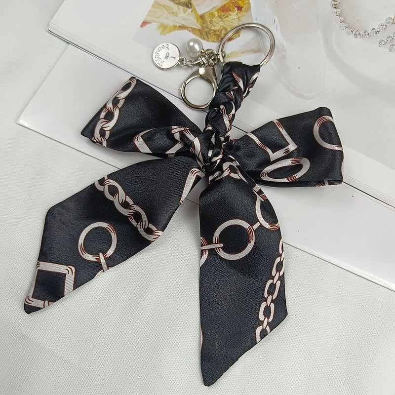 Sweet Minimalist Bow Knot Cloth Metal Unisex Bag Pendant Keychain