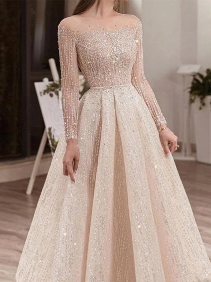 Midi sequined dress with round neck and long sleeves