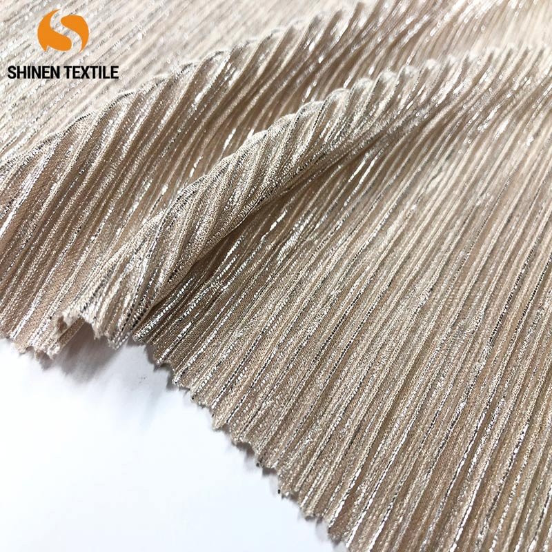 140G 100%polyester Pleated golden foiled bronzed fabric in high quality. Chinese factory