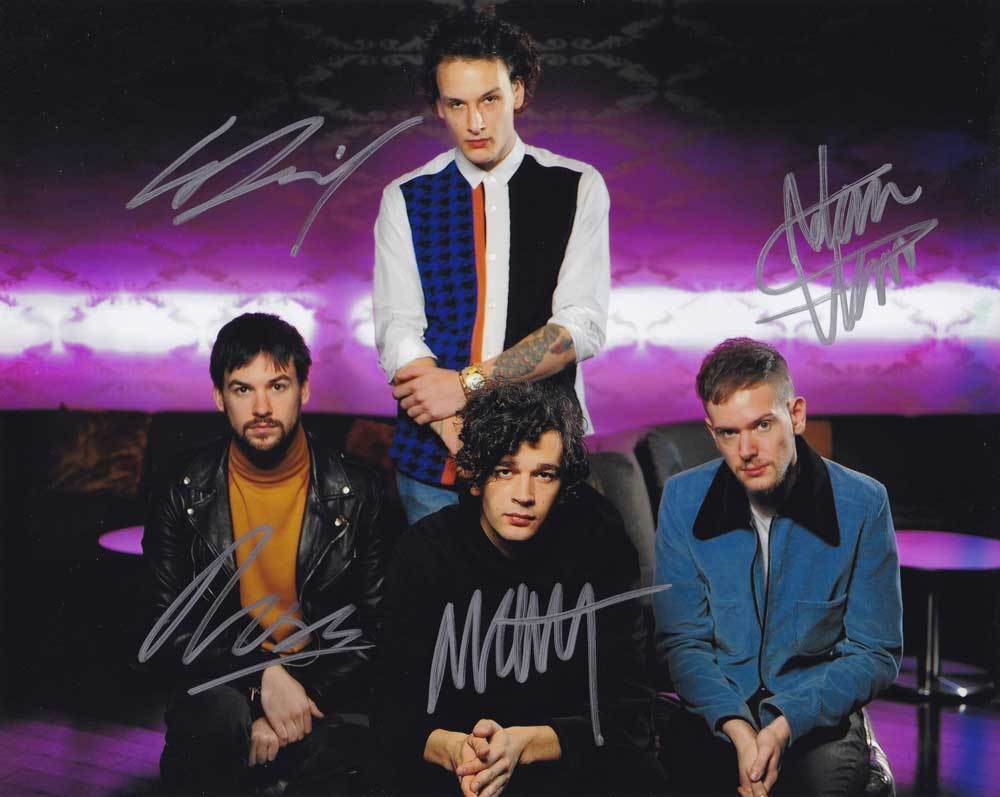 The 1975 In-Person AUTHENTIC Autographed Group Photo Poster painting SHA #11237