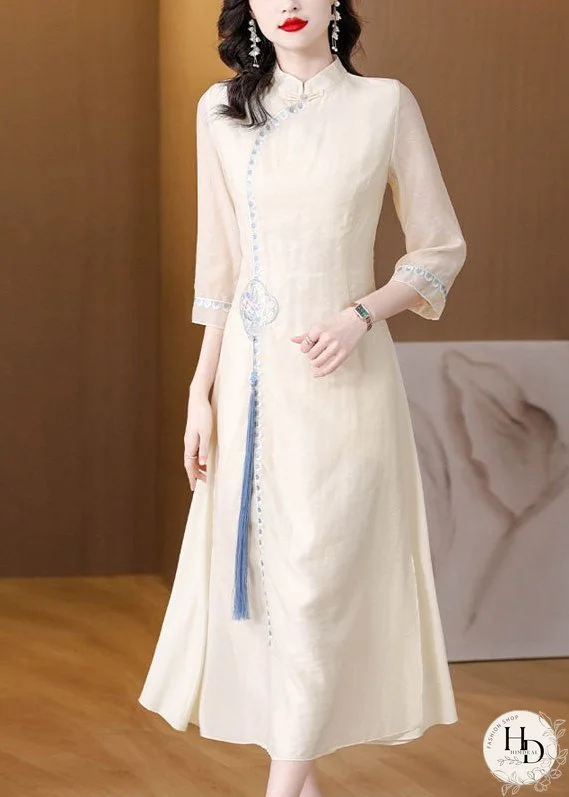 Stylish Apricot Stand Collar Embroideried Tassel Silk Long Dresses Fall