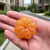 Hand-carved orange shape from pure natural jade - a collectible item