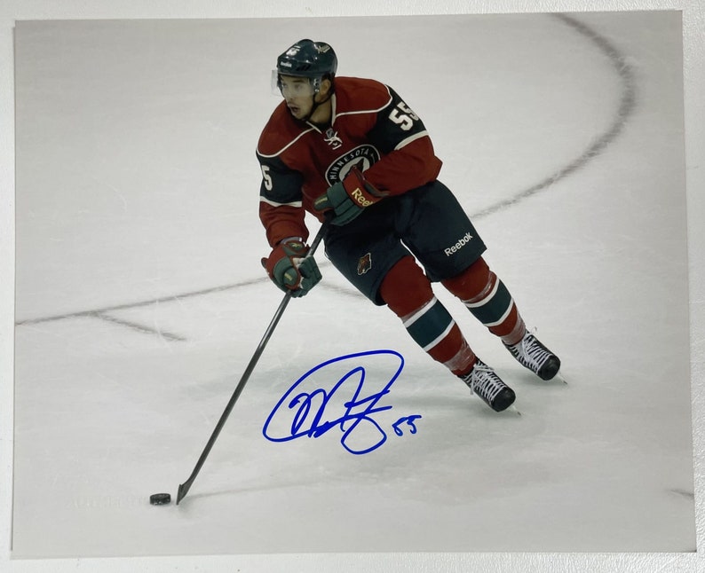 Mathew Dumba Signed Autographed Glossy 8x10 Photo Poster painting Minnesota Wild - COA Matching Holograms