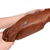 Sac &agrave; bandouli&egrave;re en cuir souple &agrave; pochettes multiples