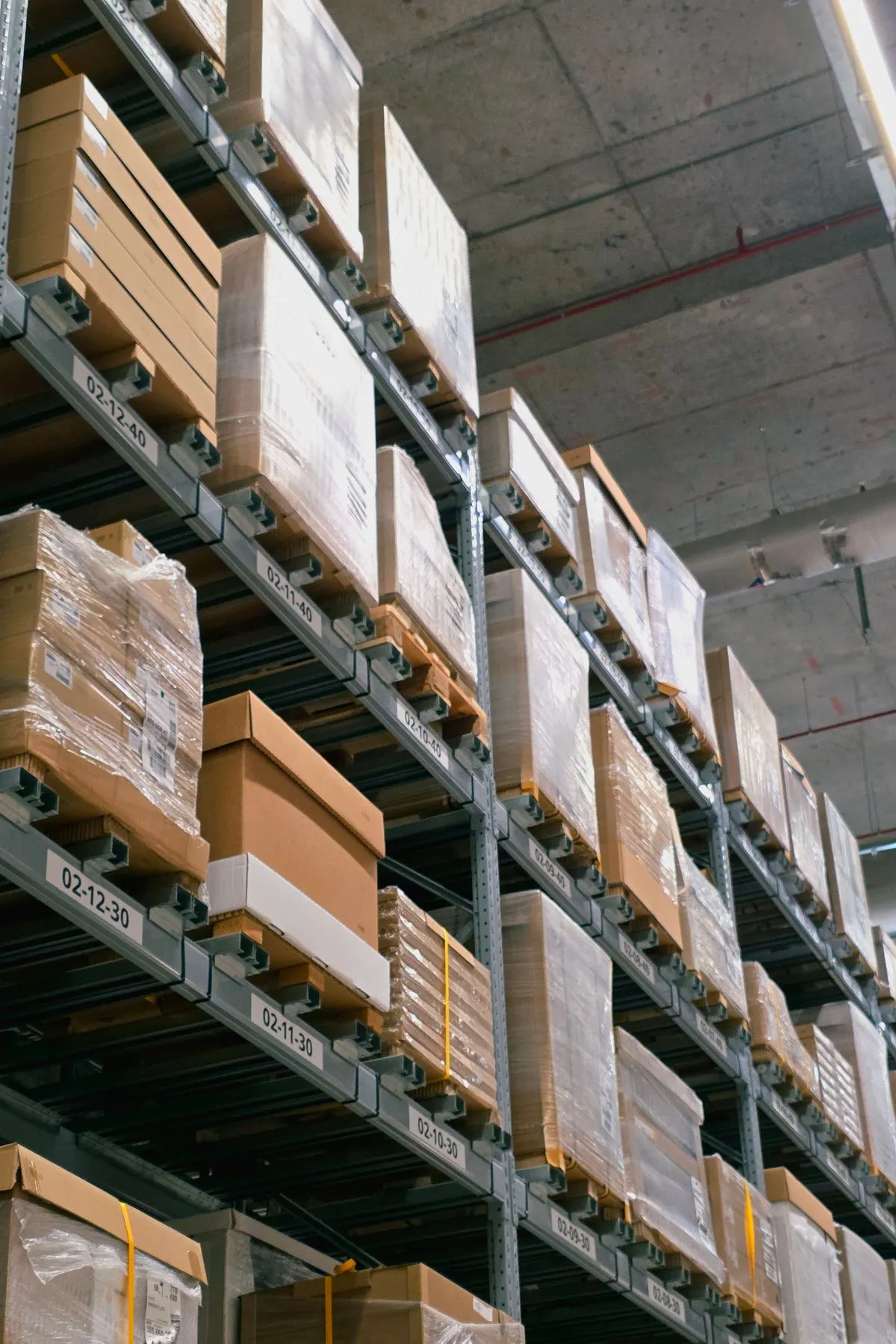 Warehouse shelves with cardboard cartons