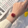 Bracelet de perles avec n&oelig;ud rose rouge