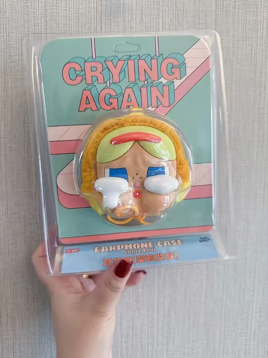 New crying baby earphone bag, vinyl face plush keychain, Southeast cross-border pendant, doll tide play series pendant batch