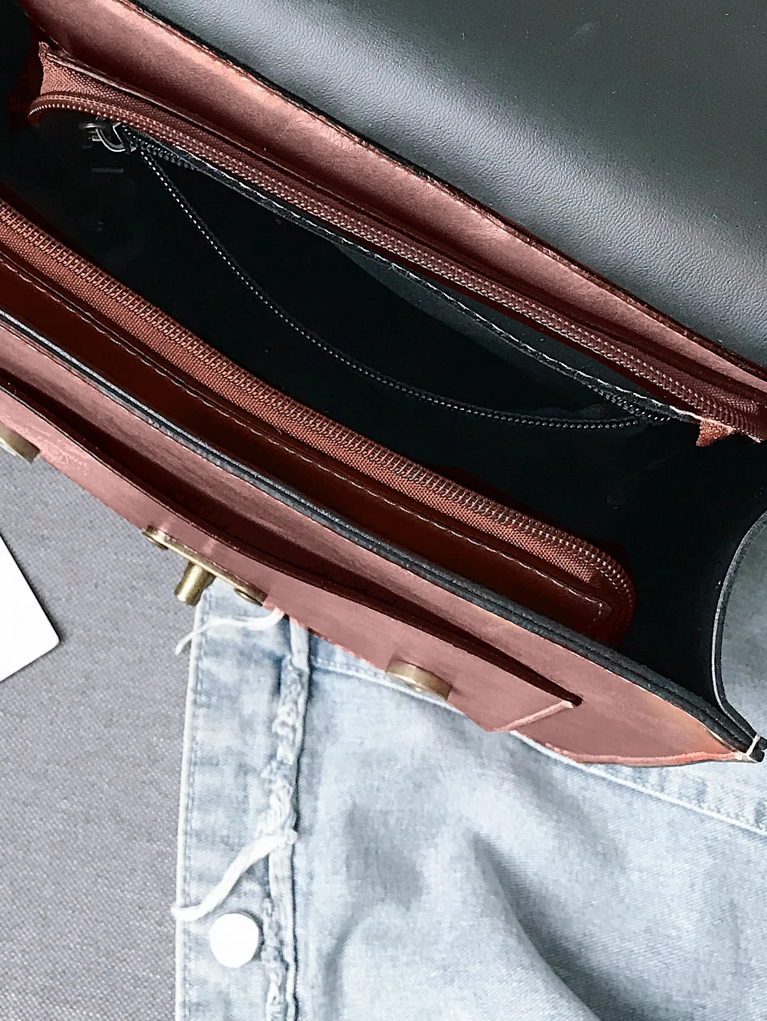 Double buckle decorative flip back backpack